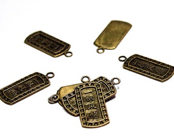 Safe Trip Pendant- jewelry supplies, antiqued brass charms, antiqued brass pendants, Chinese symbol pendant, bronze pendants, bronze charms