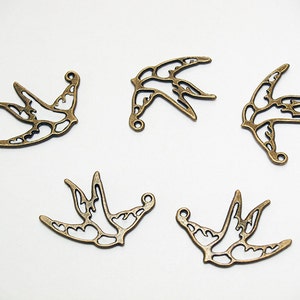 Antiqued Brass Swallows- lead free pendants- lead free jewelry findings- lead free charms- bronze pendants- bird pendants- bird charms