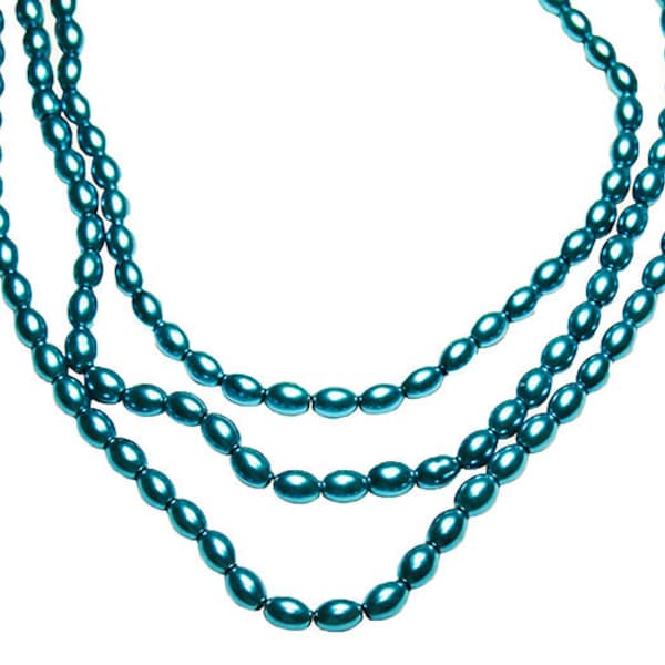 Aqua Waters- glass beads- glass pearls- oval shaped pearls- bluegreen pearls- designer beads- jewelry supplies- beading supplies- aqua beads