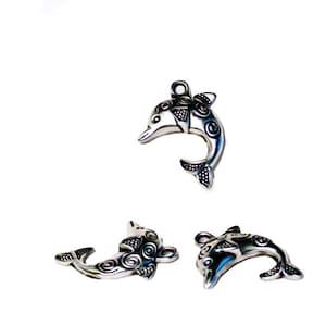 The Decorated Dolphin- silver pewter charm- silver charm- dolphin charm- beach theme charms- symbolic dolphin charm- designer findings