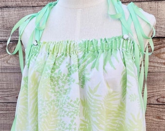 Tekstylia vintage z recyklingu, rozety z kwiatowym wzorem, wstążka, zrównoważona moda, klimat festiwalu boho, styl magnolii, sztuka noszona na ciele, kokietka