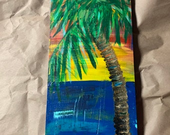 RhondaK palm tree with sunset or sunrise on pine board styled with knotted rope