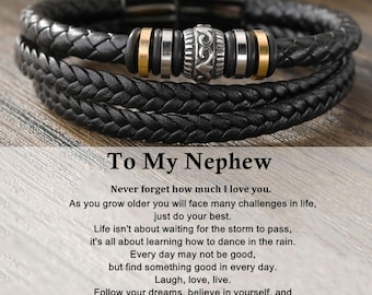 May include: Black braided leather bracelet with silver and gold-tone accents. The bracelet has a magnetic clasp. Text on the image reads "To My Nephew" and a loving message. A thoughtful gift.