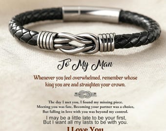 May include: Black braided leather bracelet with a stainless steel knot design clasp. The text "To My Man" and a loving message are printed below the bracelet. A perfect gift for a loved one.