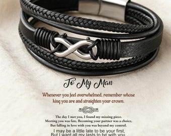 May include: Black leather bracelet with multiple strands and a silver infinity symbol clasp. The bracelet has a magnetic clasp. Text on the image reads "To My Man" and a romantic message.