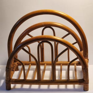 Vintage arch-shaped rattan magazine rack