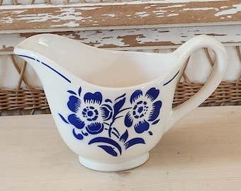Gravy boat or milk jug from the French factory in Badonviller. Vintage.