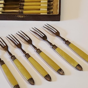 6 art deco cake knives and 6 forks