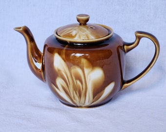 Chinesische Keramik-Teekanne im Vintage-Stil mit Marmoreffekt.