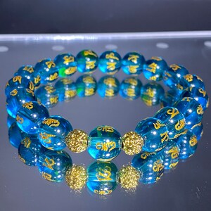 Zabel 18k Gold ball bracelet lucky charm