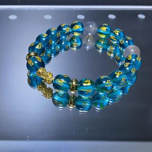 Lucky 18k Gold Small Pixiu Piyao. Blue Onyx with golden mantra prayer