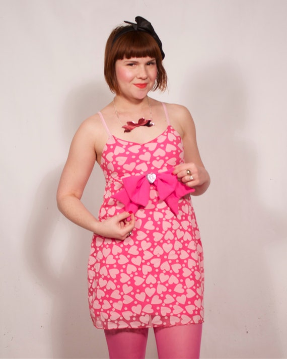 pink dress with black hearts VENUS Heart Cutout Mini Dress | Granita