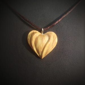 Geometric heart pendant with wooden wave pattern Original romantic necklace carved from beech Wooden heart pendant with details