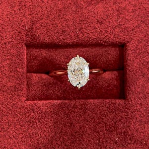 1.5 Carat Oval Lab Grown Diamond Engagement Ring: 14k Gold Solitaire