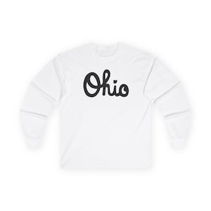 May include: White long-sleeved t-shirt with a black cursive "Ohio" graphic.