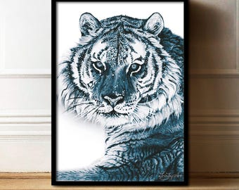 May include: A framed art print featuring a detailed illustration of a tiger's face. The artwork is rendered in shades of blue and white, with visible brushstrokes and textures. The tiger's intense gaze and fur details are prominent. The artist's signature is visible.
