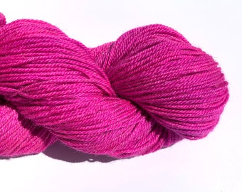 Blue face Leicester, Tussah Silk, and Shiny Gold Stellina, Hand dyed Fuchsia Yarn