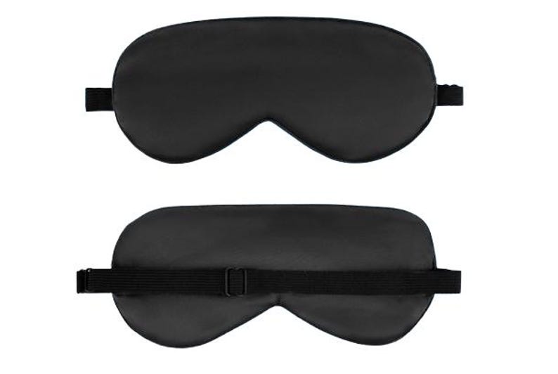 May include: Black sleep mask with an adjustable strap. The mask is made of a soft, comfortable material and is designed to block out light.