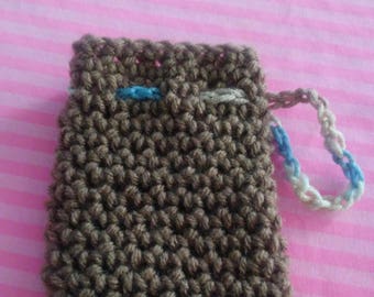 crochet brown soap saver with multicolored string