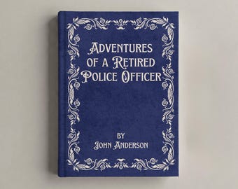 May include: A dark blue hardback book titled Adventures of a Retired Police Officer by John Anderson. The front cover features a white decorative floral border frame surrounding the text, which is printed in a white serif font style.