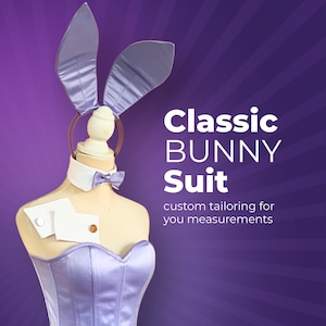 May include: A lavender bunny suit on a mannequin, featuring a corset, bow tie, and bunny ears. The text "Classic BUNNY Suit" is displayed on a purple background. The suit is custom tailored.