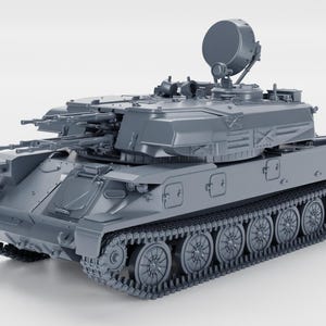 Może przedstawiać: Szary model czołgu wojskowego z wieloma lufami i radarem. Czołg ma gąsienicową podstawę i jest ustawiony na białym tle. Model jest szczegółowy i wydaje się być repliką prawdziwego pojazdu.