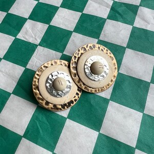 Bree Vintage Large Round Mixed Metal Hammered Dial Clip On Earrings Brass Silver Tone and Bone Color Circular Statement Earrings 14th Street