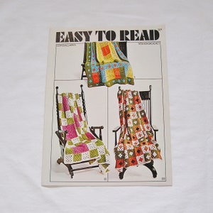 May include: A crochet pattern booklet titled "Easy to Read" with a price of 50 pence. The booklet is for Volume 103 of crochet patterns. The cover shows four different crochet blankets in various colours, including green, yellow, orange, pink, and white.