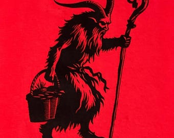 May include: A black silhouette of a goat-like creature with horns and a long beard, holding a staff and a basket. The creature is standing on a red background.