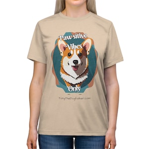 Happy Corgi on T-shirt"
"Paw Vibes Only Tee Design"
"Fun Dog Lover T-Shirt Graphic"