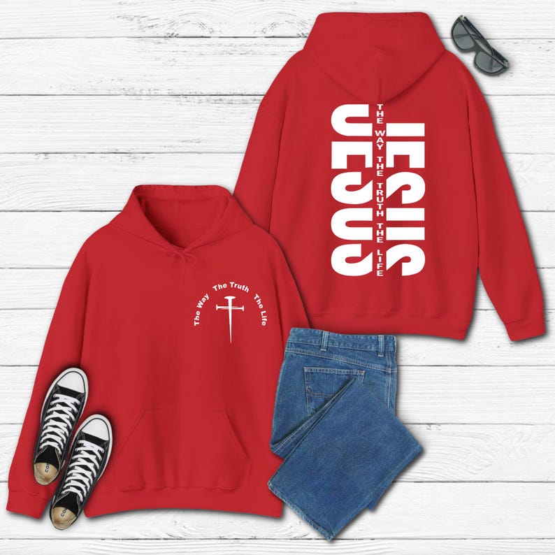 May include: Red hoodie with a white cross and the text "The Way The Truth The Life" on the front and the text "JESUS THE WAY THE TRUTH THE LIFE" on the back.