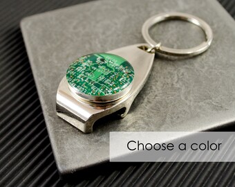 May include: Silver bottle opener keychain with a round green circuit board design. Choose a color.