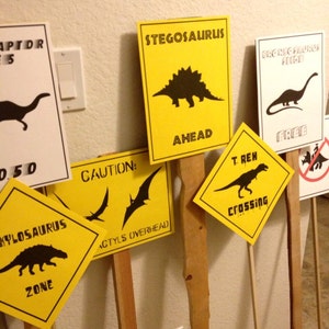 PDF: Set of 7 Dinosaur Crossing Signs - Dinosaur Themed Party Warning Caution Zone Paleo Caveman silhouette birthday