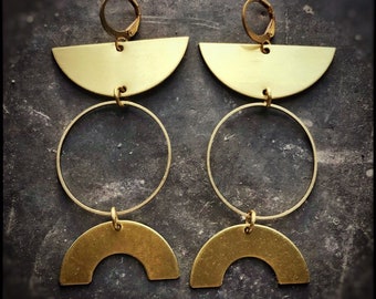 Brass circle, U, and semi circle Earrings with brass ear wires.