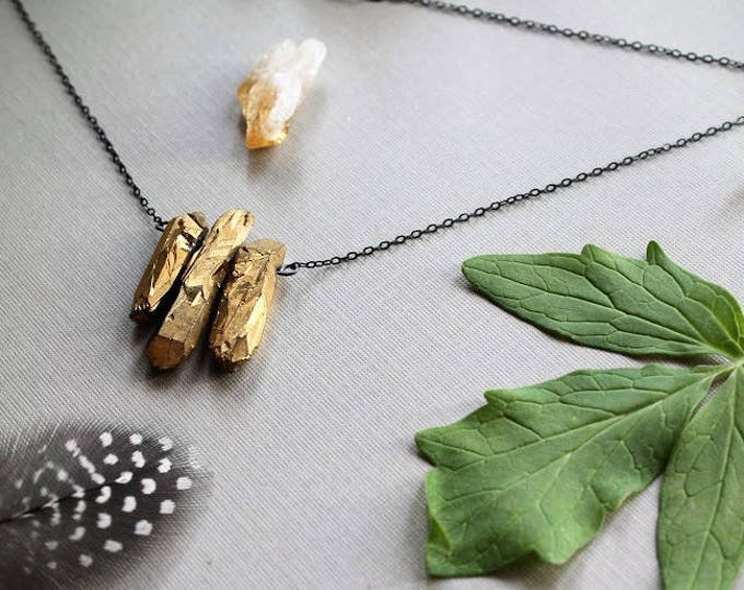 The Midas Touch // gold quartz point necklace