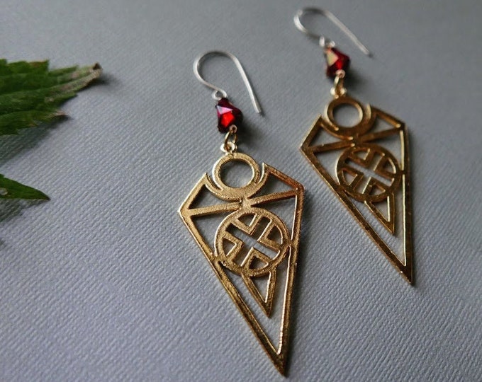 Smolder // golden geometric charm and glowing red crystal earrings