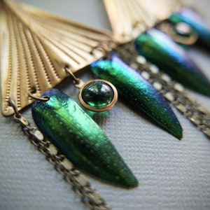 The Hidden Realm // long triangle earrings with beetle wings and glowing green orbs
