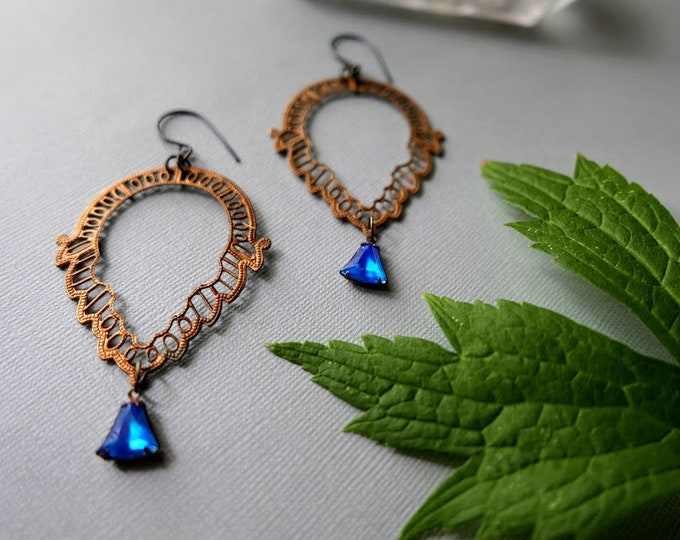 Vision Quest // large filigree earrings with a glowing blue crystal