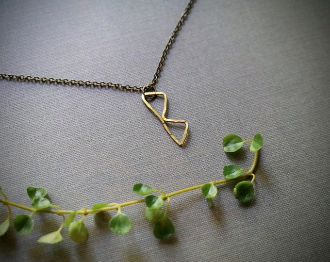 Transformation // viking rune necklace in brass