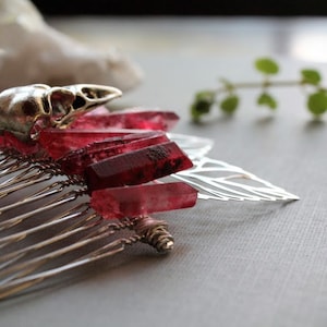 Red Sparrow // silver bird skull hair comb with silver leaves and blood red crystals