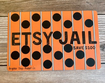 May include: Orange and black card with a jail cell pattern and the text "Etsy Jail" and "Save $100". The card is from Brighter Days Budget Co.