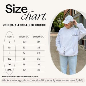 May include: A size chart for a unisex fleece-lined hoodie, displaying width and length measurements in inches for sizes S through 3XL. The chart includes a visual guide showing how to measure width and length on a light grey hooded sweatshirt.