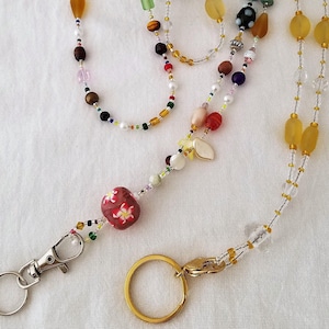 Collar con cordón de cuentas mixtas de 35&quot;: porta credencial, teléfono y llaves