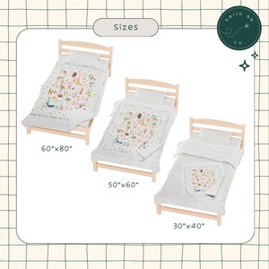 May include: Three wooden beds with white bedding and colorful alphabet print fabric. The beds are 60 inches by 80 inches, 50 inches by 60 inches, and 30 inches by 40 inches.