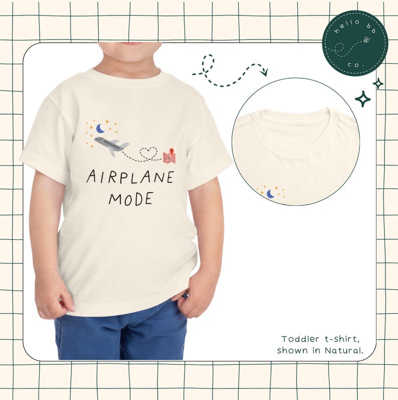 May include: A white toddler t-shirt featuring a graphic of an aeroplane flying over a heart and a house. The text "AIRPLANE MODE" is printed below the graphic. The shirt is shown in the colour "Natural".