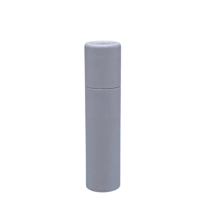 May include: A white cardboard tube with a rounded top and bottom. The tube is empty and ready to be filled with lip balm, lotion, or other products.
