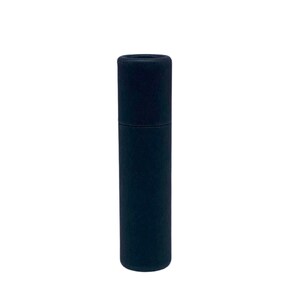 May include: A black cardboard tube with a rounded top and bottom.