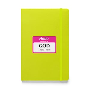 May include: A bright yellow notebook with a pink name tag that says "Hello my name is GOD They/Them".