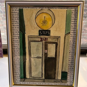 May include: A watercolor painting of a doorway with a sign that reads "STEPS 2121". The doorway is framed by a light brown door with a dark brown door behind it. The painting is surrounded by a white frame with a gold border. The text "Steps On Broadway" is repeated around the border of the painting.