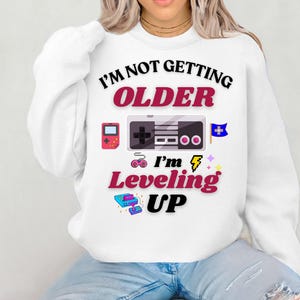 Funny &#39;Leveling Up&#39; Sweatshirt: Sarcastic Gamer Birthday Gift